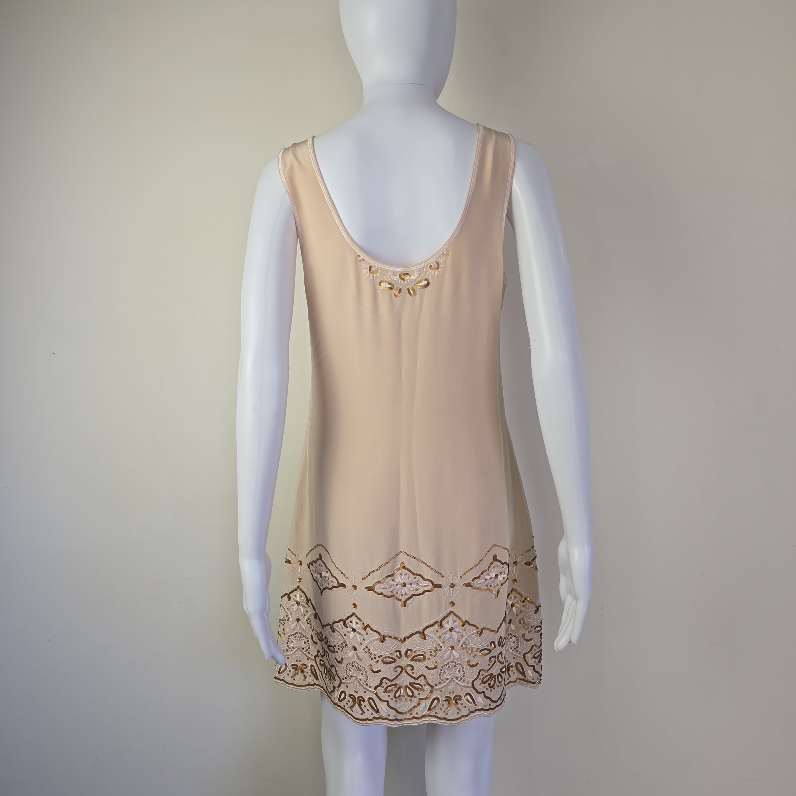 Beige dress on a light background