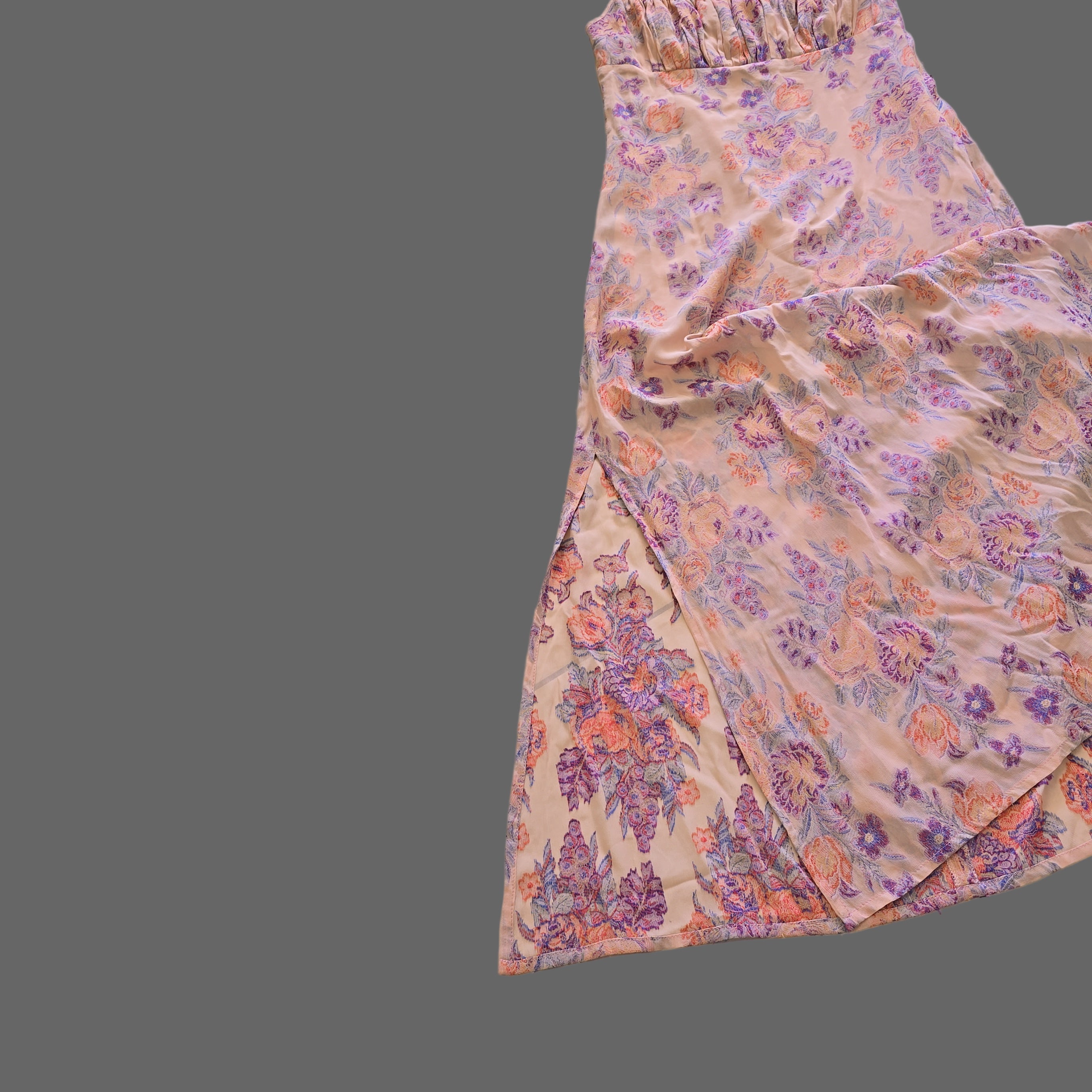 Floral-patterned fabric on a tiled floor