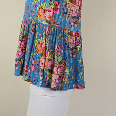 Blue floral top with on a light background