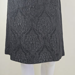 Black textured fabric on a white background