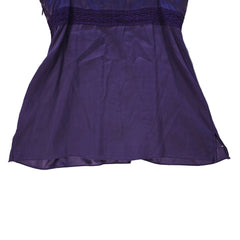 Purple lace-trimmed top on a light background