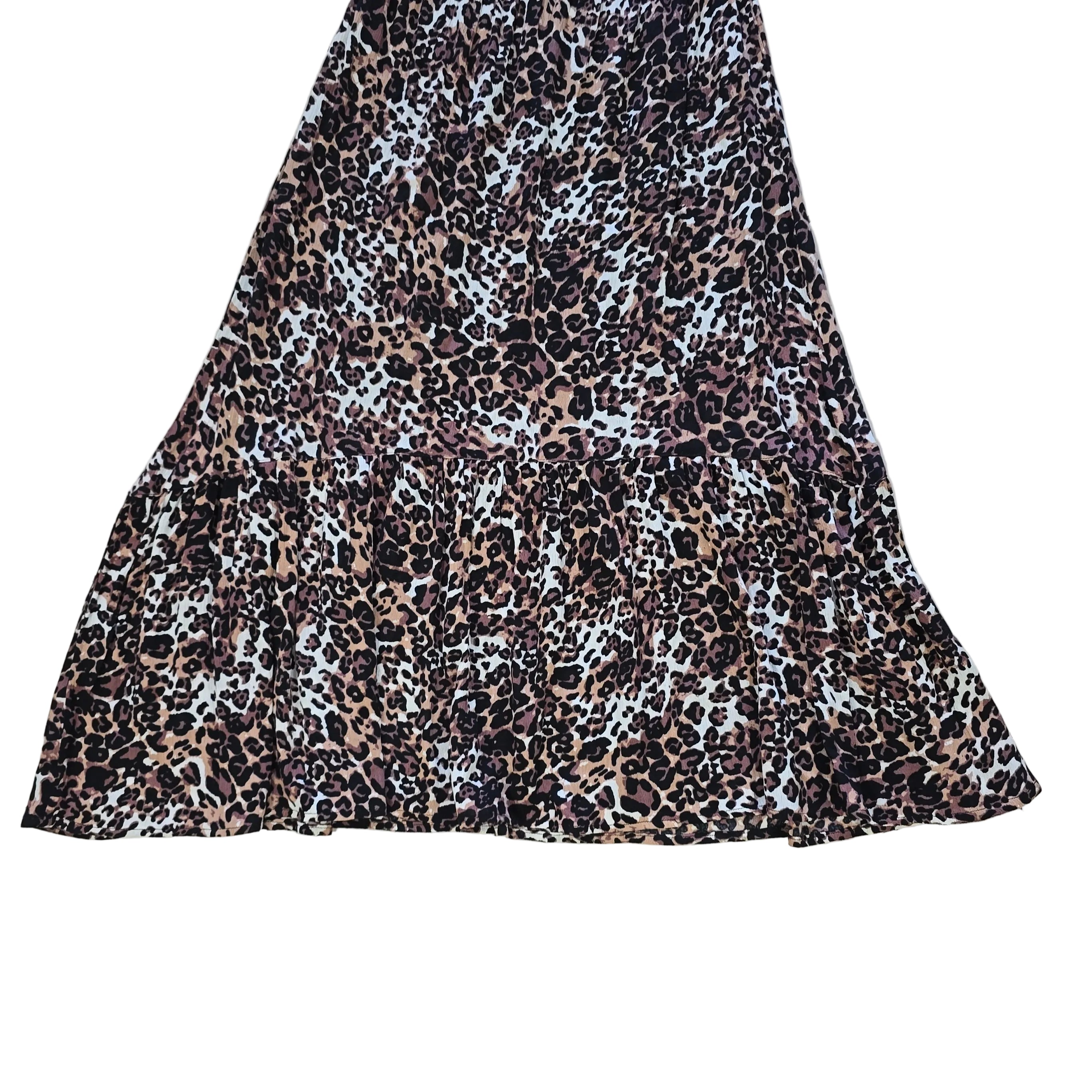 Leopard print dress on a light background