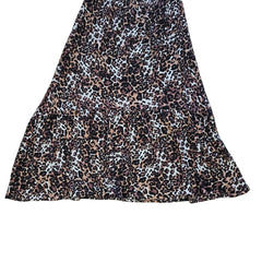 Leopard print dress on a light background