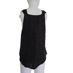 Black garment on a mannequin against a light background