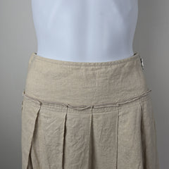 Close-up of a beige fabric texture on a neutral background