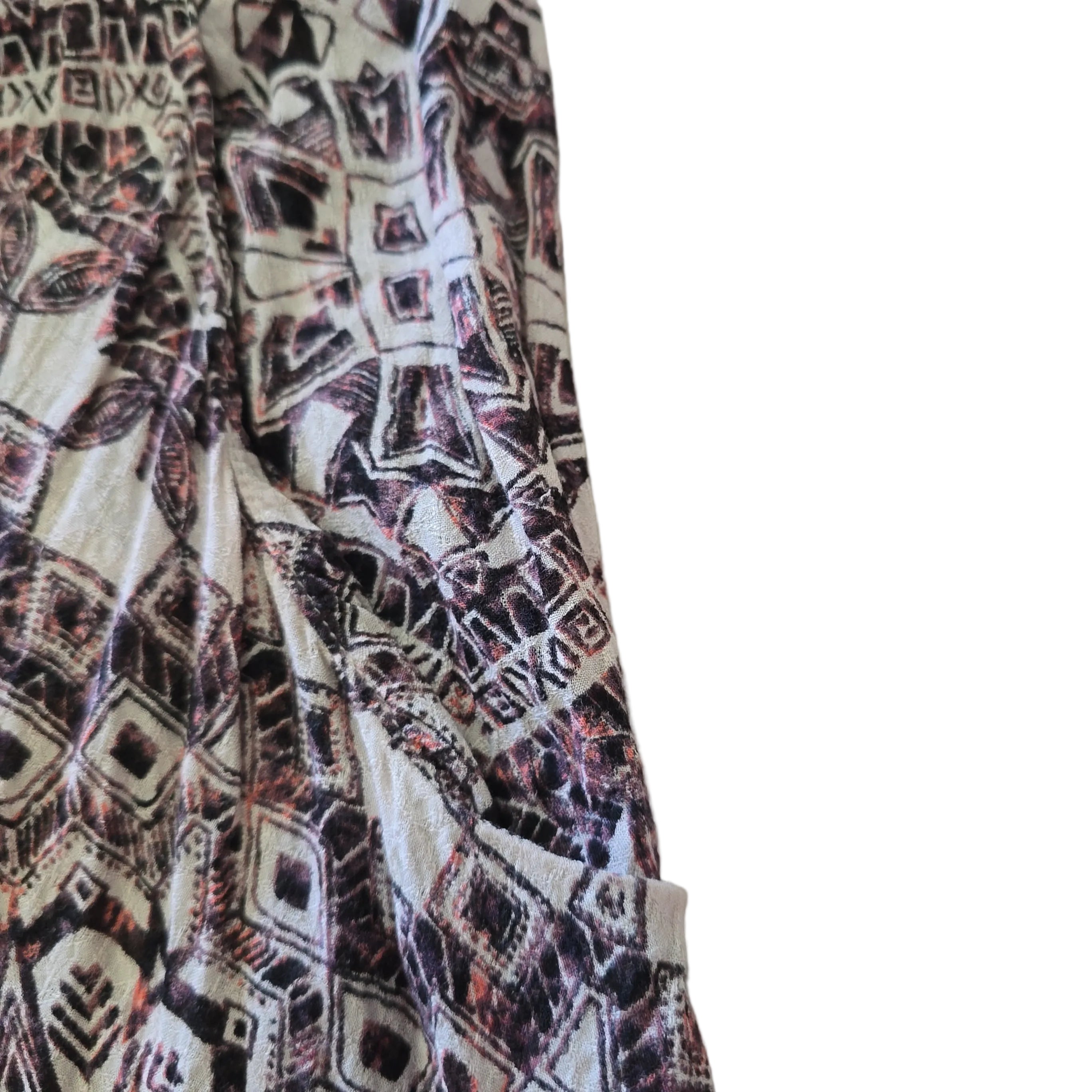 Patterned fabric with geometric design on a plain background