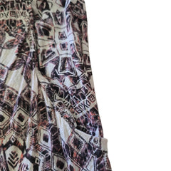 Patterned fabric with geometric design on a plain background