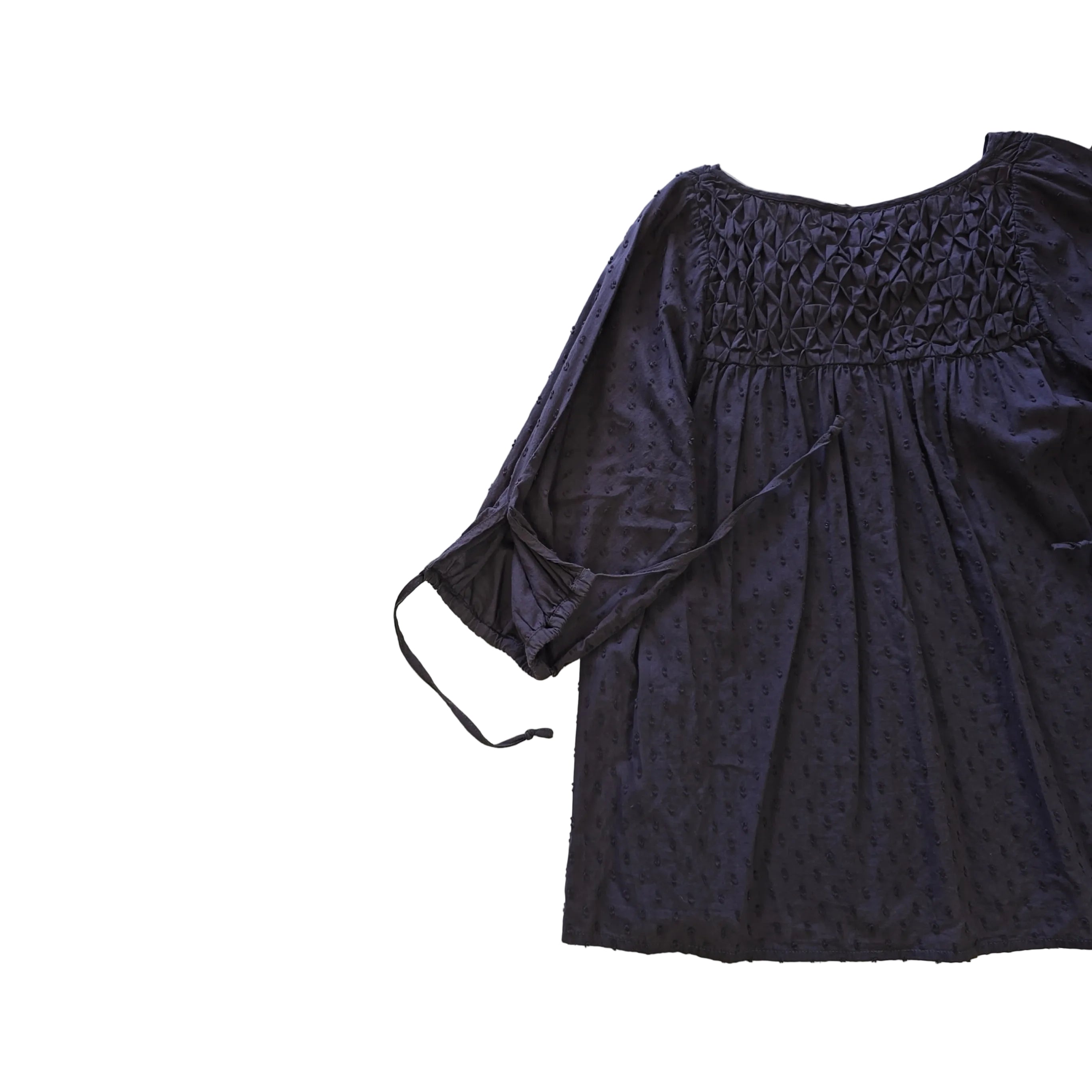 Brown long-sleeve top on a light background