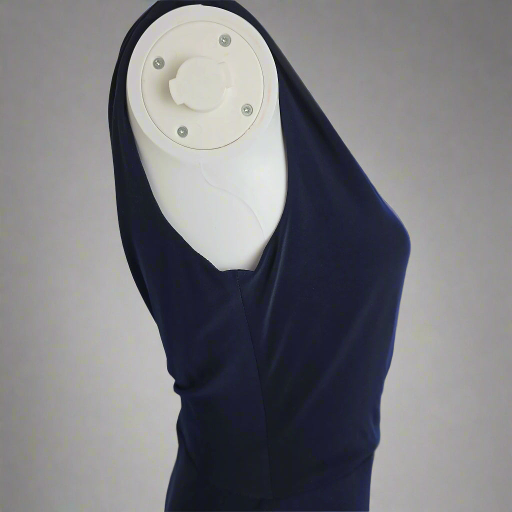 Navy blue dress on a light gray background