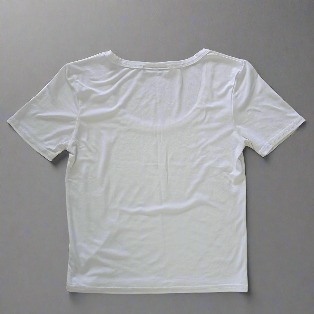 White t-shirt on a tiled floor