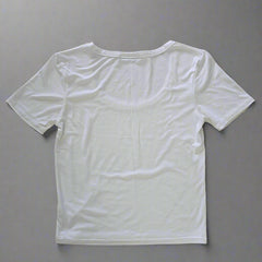 White t-shirt on a tiled floor
