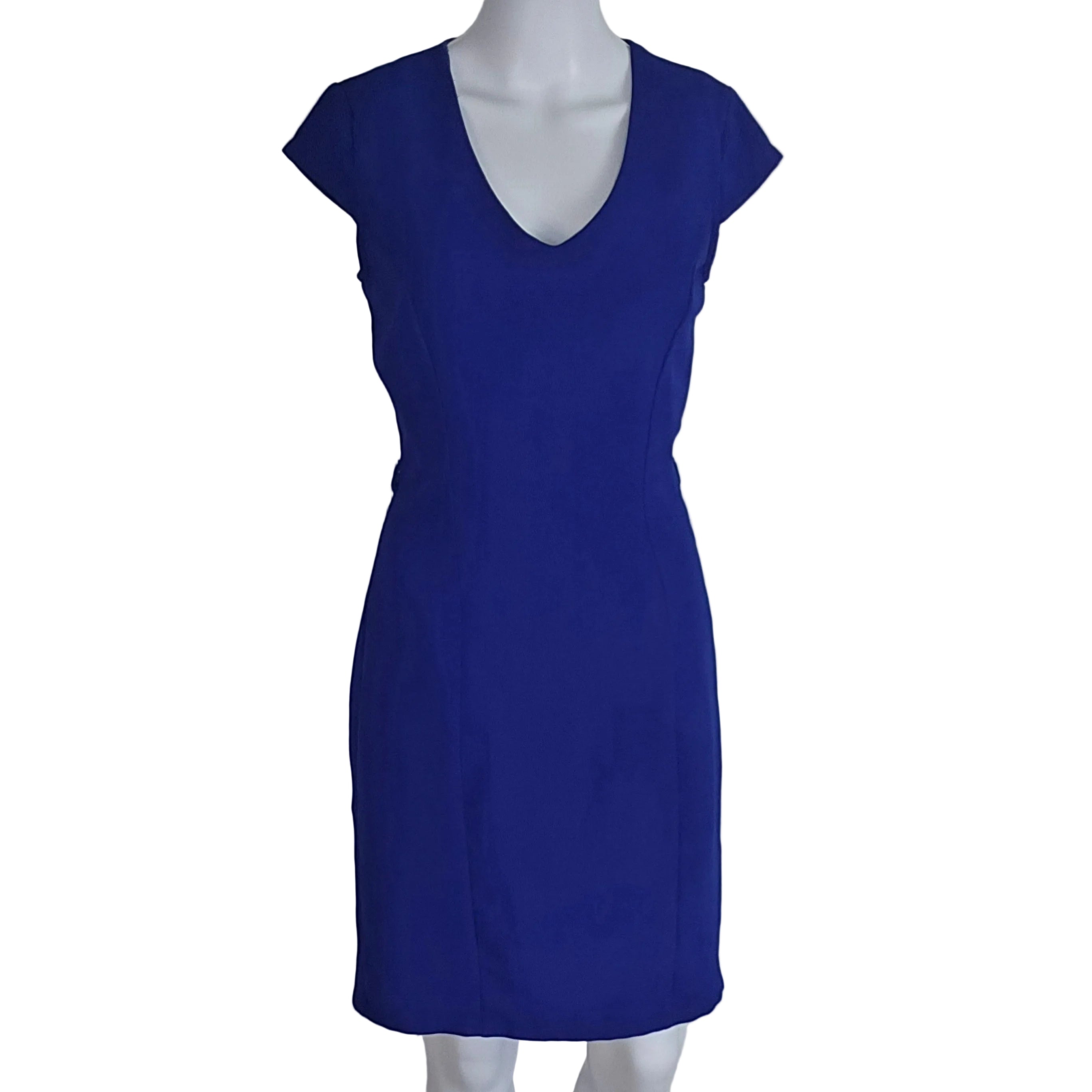 Blue dress on a mannequin against a light background