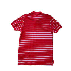 Red and white striped polo shirt on a light background