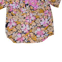 Floral-patterned shirt on a light background
