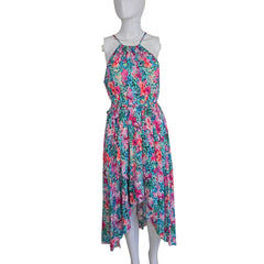 Floral dress on a mannequin against a plain background