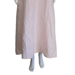 Light pink dress with floral straps on a light background