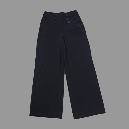 Black pants on a tiled floor 2736