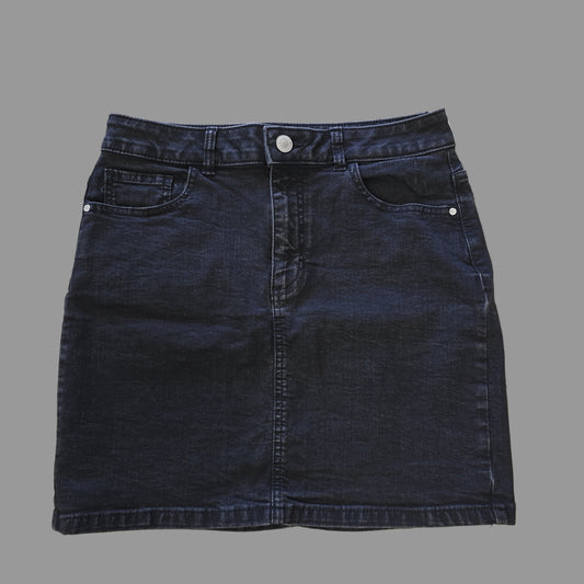 Folded dark grey denim skirt on a tiled floor 2736