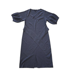 Grey dress on a tiled floor