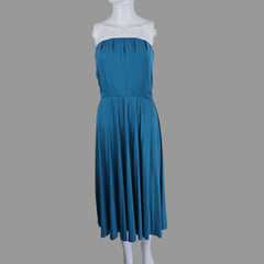 Blue pleated dress on a mannequin against a plain background
