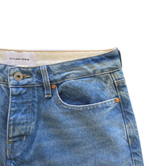 Pair of blue jeans on a light background