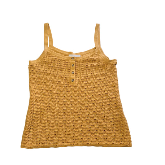 Yellow knitted tank top on a light background 2736