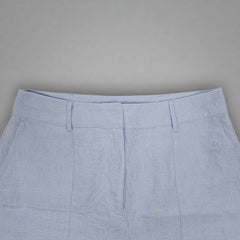 Light blue skirt on a gray background