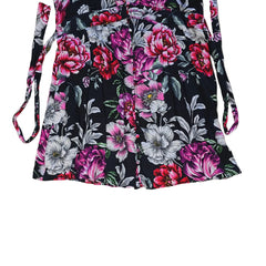 Floral-patterned mini dress on a light background