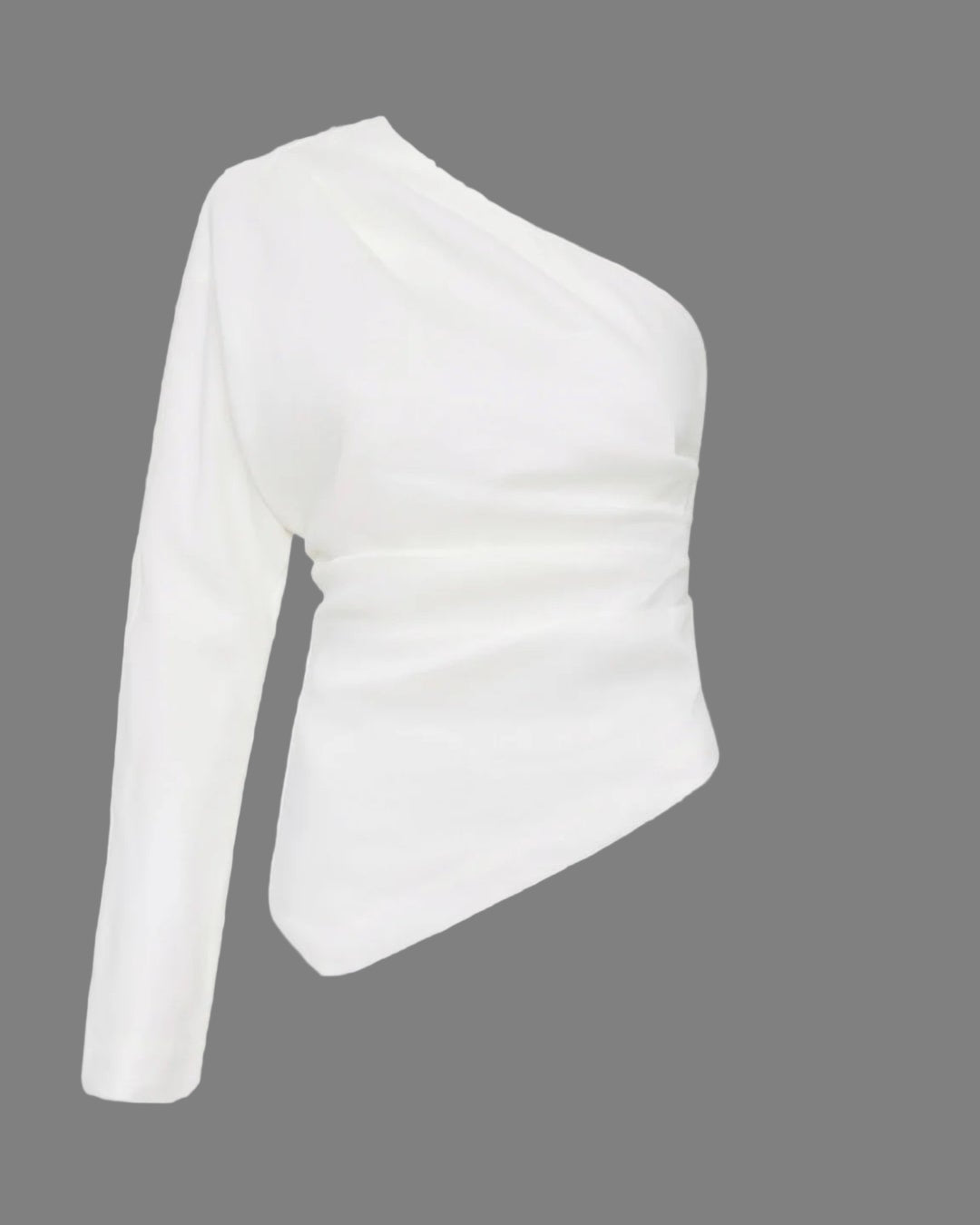 White one-shoulder top on a white background