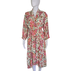 Floral patterned wrap style dress on a light background