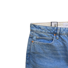 Pair of blue jeans on a light background