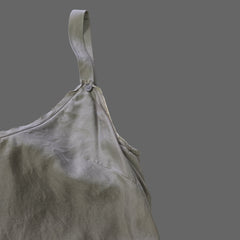 Gray top on a tiled floor