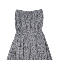 Floral-patterned strapless dress on a light background