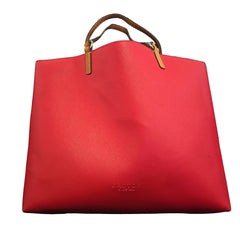 Red handbag with a visible brand logo on a light background