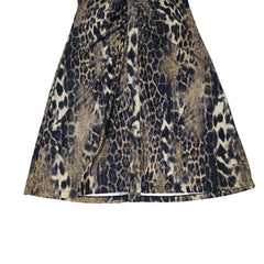 Leopard print dress on a light background