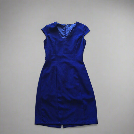 A vintage cobalt blue fitted dress with a V-neckline, cap sleeves, and a concealed back zipper. 1024
