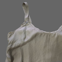 Light gray fitted top with a white tiled floor.