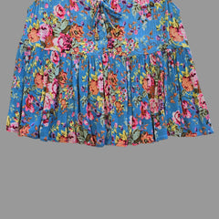 Blue floral top with on a light background