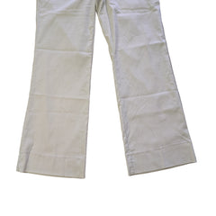 beige and white striped pants on a tiled floor