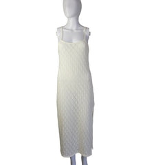 White textured dress on a light background.