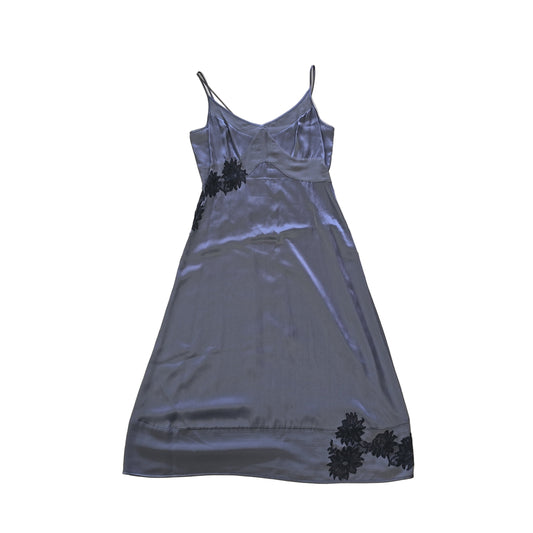 Grey dress with black floral patterns on a light background. 2736