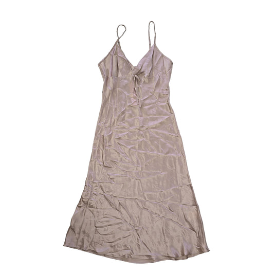 Beige dress on a light background 2736