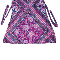 Pink and purple patterned dress on a light background