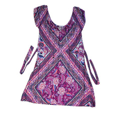 Pink and purple patterned dress on a light background