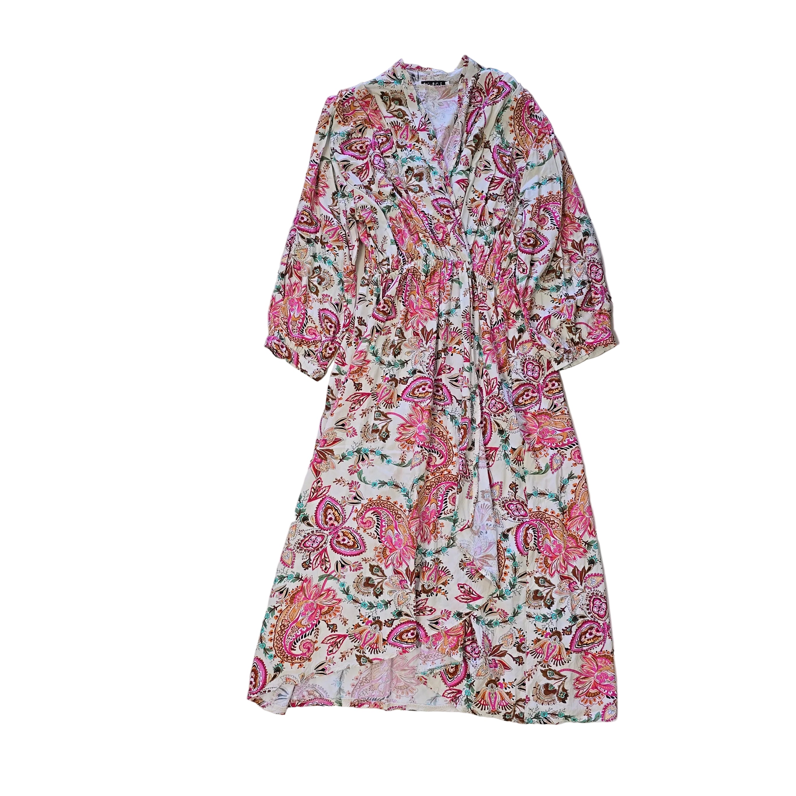 Floral patterned wrap style dress on a light background