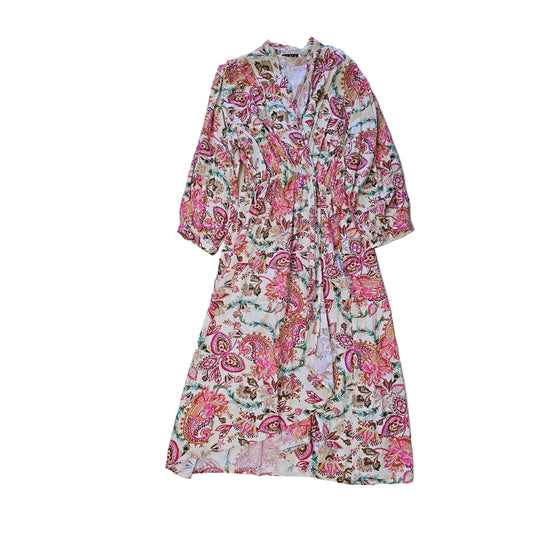 Floral patterned wrap style dress on a light background 2736