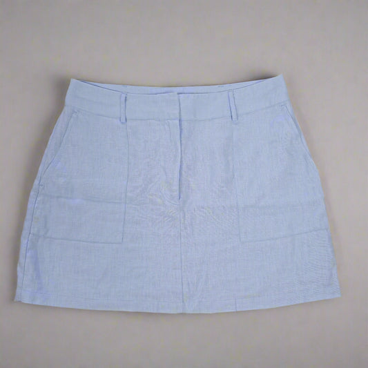 Light blue skirt on a beige background 1024