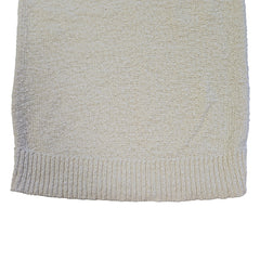 White knitted tank top on a light background