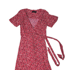 Red and black patterned dress on a light background