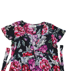 Floral-patterned mini dress on a light background